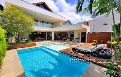 Imagem: A casa em condomínio possui 4 Dormitórios, 5 Banheiros, 4