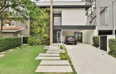 Imagem: A casa em condomínio possui 4 Dormitórios, 5 Banheiros, 4