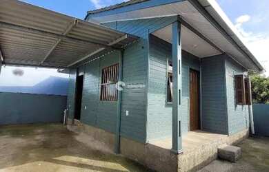 Imagem: A casa possui 2 Dormitórios, 1 Banheiro, 1 Vaga na garagem