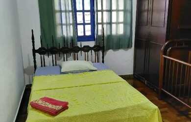 Imagem: A casa possui 3 Dormitórios, 2 Banheiros, 1 Vaga na garagem