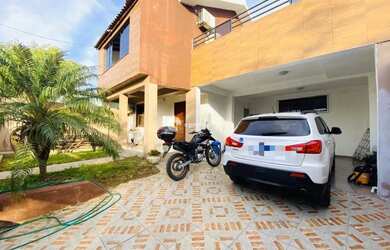 Imagem: A casa possui 2 Dormitórios, 4 Banheiros, 4 Vagas na garagem