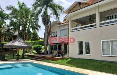 Imagem: A casa em condomínio possui 5 Dormitórios, 5 Banheiros, 5