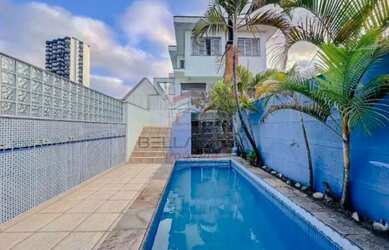 Imagem: A casa possui 3 Dormitórios, 4 Banheiros, 4 Vagas na garagem