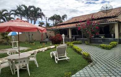 Imagem: A casa possui 5 Dormitórios, 5 Banheiros, 5 Vagas na garagem