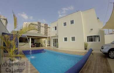 Imagem: A casa possui 3 Dormitórios, 4 Banheiros, 4 Vagas na garagem