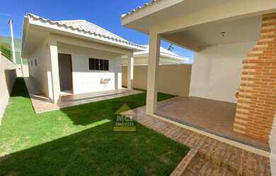 Imagem: A casa possui 2 Dormitórios, 2 Banheiros, 5 Vagas na garagem