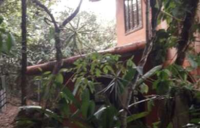 Imagem: A casa em condomínio possui 1 Dormitório, 2 Vagas na garagem