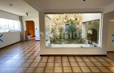 Imagem: A casa possui 4 Dormitórios, 5 Banheiros, 327m² de Área e