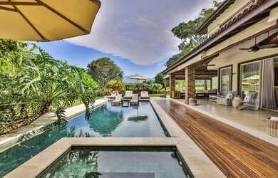 Imagem: A casa em condomínio possui 5 Dormitórios, 5 Banheiros, 3