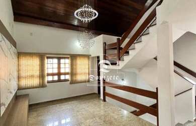 Imagem: A casa possui 3 Dormitórios, 5 Banheiros, 5 Vagas na garagem