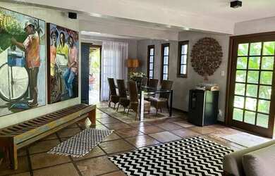 Imagem: A casa possui 5 Dormitórios, 5 Banheiros, 4 Vagas na garagem