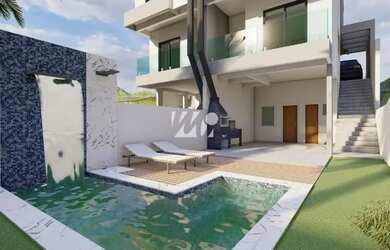 Imagem: A casa possui 3 Dormitórios, 2 Banheiros, 2 Vagas na garagem