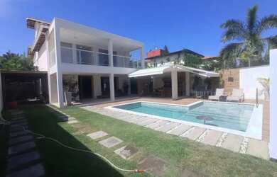 Imagem: A casa em condomínio possui 4 Dormitórios, 4 Banheiros, 5