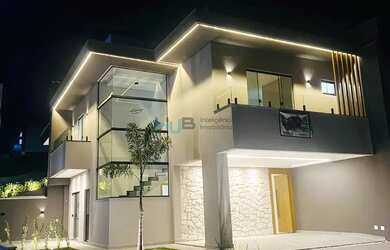 Imagem: A casa possui 3 Dormitórios, 4 Banheiros, 2 Vagas na garagem