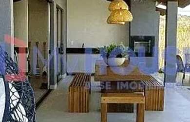 Imagem: A casa em condomínio possui 4 Dormitórios, 4 Banheiros, 2