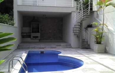 Imagem: A casa em condomínio possui 4 Dormitórios, 5 Banheiros, 4