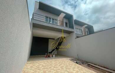 Imagem: A casa possui 2 Dormitórios, 3 Banheiros, 4 Vagas na garagem