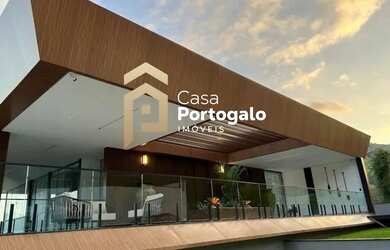 Imagem: A casa possui 5 Dormitórios, 5 Banheiros, 4 Vagas na garagem