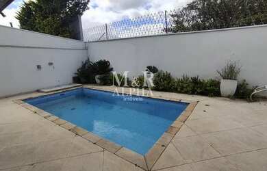 Imagem: A casa em condomínio possui 4 Dormitórios, 5 Banheiros, 4