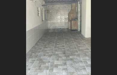 Imagem: A casa possui 3 Dormitórios, 4 Banheiros, 3 Vagas na garagem