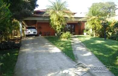 Imagem: A casa possui 2 Dormitórios, 2 Banheiros, 3 Vagas na garagem