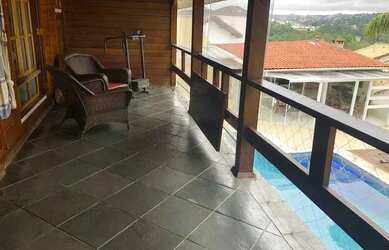 Imagem: A casa em condomínio possui 4 Dormitórios, 5 Banheiros, 4