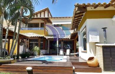 Imagem: A casa possui 4 Dormitórios, 4 Banheiros, 2 Vagas na garagem