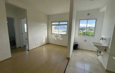 Imagem: O apartamento possui 2 Dormitórios, 1 Banheiro, 1 Vaga na garagem