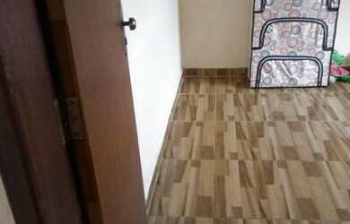 Imagem: A casa possui 3 Dormitórios, 1 Banheiro, 2 Vagas na garagem