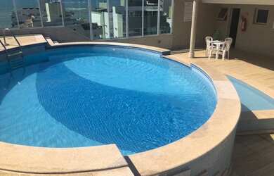 Imagem: O apartamento possui 2 Dormitórios, 1 Banheiro, 2 Vagas na