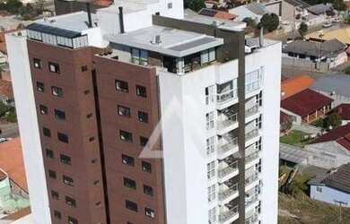 Imagem: O apartamento possui 3 Dormitórios, 2 Banheiros, 2 Vagas na