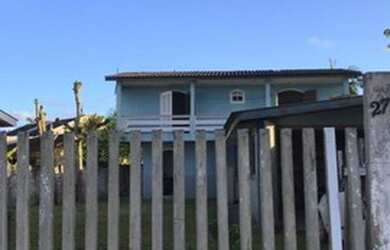 Imagem: A casa possui 2 Dormitórios, 1 Vaga na garagem e está localizado