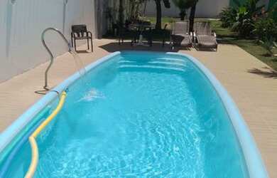 Imagem: A casa possui 3 Dormitórios, 3 Vagas na garagem e está localizado