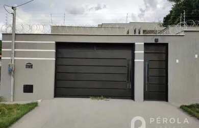 Imagem: A casa possui 3 Dormitórios, 4 Banheiros, 3 Vagas na garagem