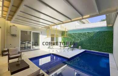 Imagem: A casa possui 3 Dormitórios, 4 Banheiros, 4 Vagas na garagem