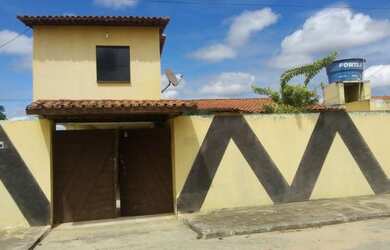 Imagem: A casa possui 3 Dormitórios, 2 Vagas na garagem e está localizado