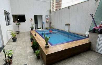 Imagem: A casa possui 3 Dormitórios, 4 Banheiros, 2 Vagas na garagem