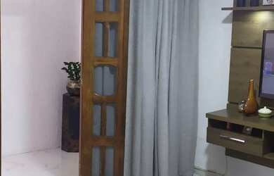 Imagem: A casa possui 3 Dormitórios, 2 Vagas na garagem e está localizado