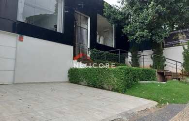 Imagem: A casa possui 3 Dormitórios, 5 Banheiros, 5 Vagas na garagem