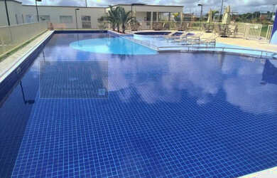 Imagem: A casa possui 3 Dormitórios, 2 Banheiros, 4 Vagas na garagem