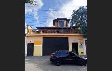 Imagem: A casa possui 2 Dormitórios, 5 Banheiros, 5 Vagas na garagem