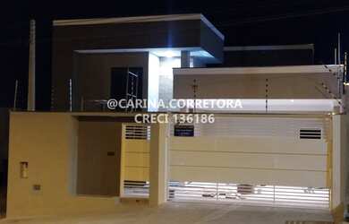 Imagem: A casa possui 3 Dormitórios, 2 Banheiros, 2 Vagas na garagem