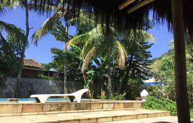 Imagem: A casa possui 5 Dormitórios, 5 Banheiros, 3 Vagas na garagem