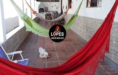 Imagem: A casa possui 3 Dormitórios, 1 Banheiro, 5 Vagas na garagem