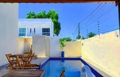 Imagem: A casa possui 2 Dormitórios, Acomodam 7 pessoas, 1 Vaga na