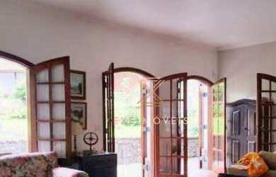 Imagem: A casa possui 3 Dormitórios, 5 Banheiros, 5 Vagas na garagem