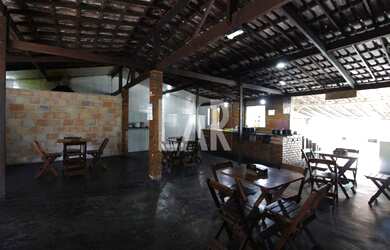 Imagem: A casa possui 4 Dormitórios, 2 Banheiros, 2 Vagas na garagem