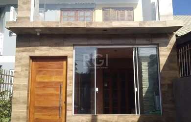 Imagem: A casa possui 2 Dormitórios, 2 Banheiros, 1 Vaga na garagem