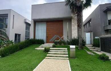 Imagem: A casa em condomínio possui 4 Dormitórios, 5 Banheiros, 5