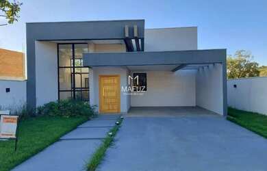 Imagem: A casa possui 3 Dormitórios, 2 Banheiros, 4 Vagas na garagem